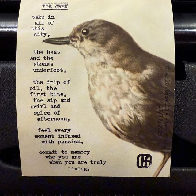 Custom poem typed live for a guest on vintage paper with a thrush illustration